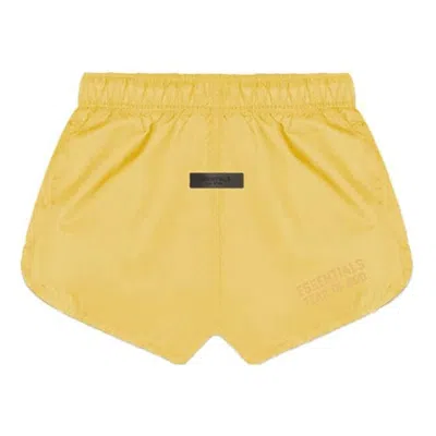 Essentials Fear Of God  Ss23 Running Nylon Short 'light Tuscan' In Yellow