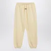 Essentials Fear Of God  Yellow Jogging Pants With Logo In Neutral