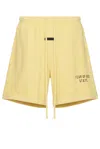 Essentials Logo-print Track Shorts In Amber