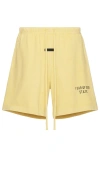 Essentials Logo-print Track Shorts In Yellow