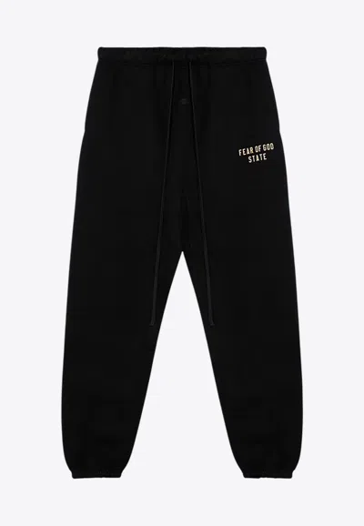 ESSENTIALS LOGO PRINT TRACK PANTS