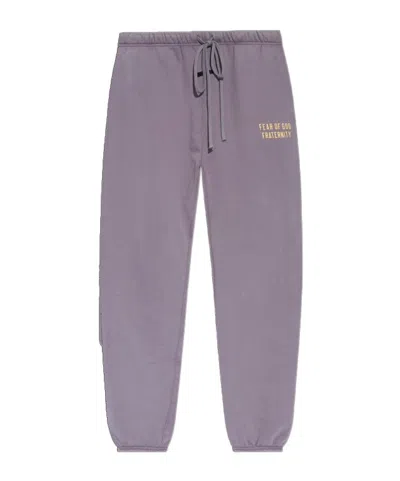 Essentials Logo Printed Track Pants In Purple