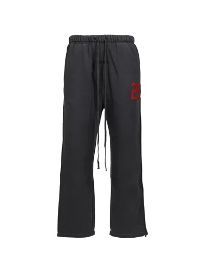 Essentials Logo-print Tearaway Trousers In Gray
