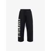 Essentials Mens Jet Black Brand-print Wide-leg Cotton-blend Jogging Bottoms In Black