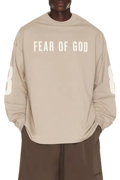 Essentials Merch Long Sleeve Tee In Neutral