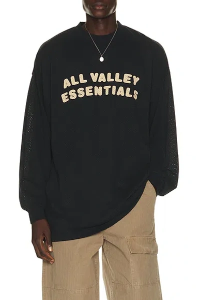 Essentials Merch Long Sleeve Tee In Black