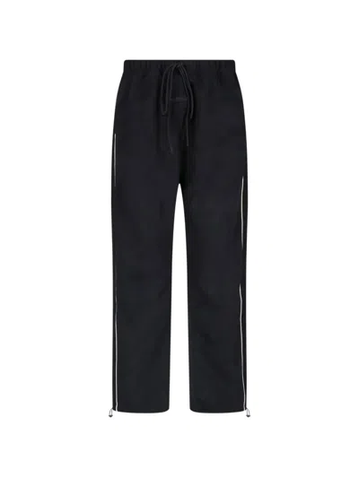 Essentials Relaxed Track Pant In Black