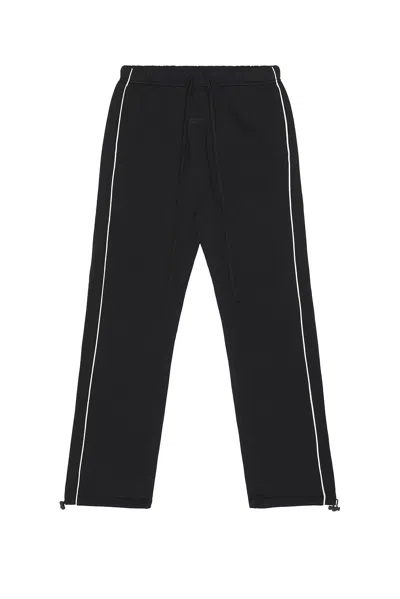 ESSENTIALS SPORTY NYLON RELAXED SWEATPANT WITH PIPING