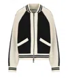 Essentiel Antwerp Black And White Faux Fur-panelled Knitted Bomber Jacket In Black