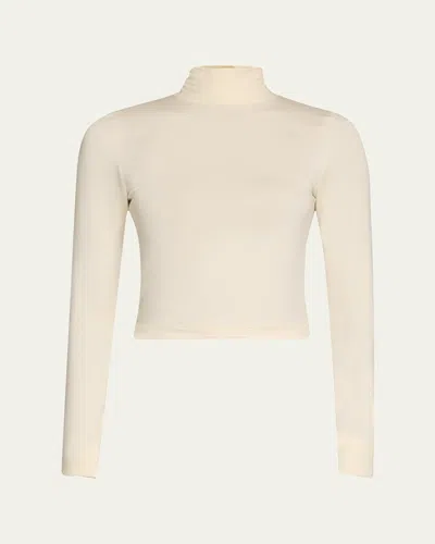 Éterne Cropped Fitted Turtleneck Top In Cream