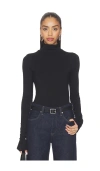 Éterne Fitted Turtleneck Top In Black