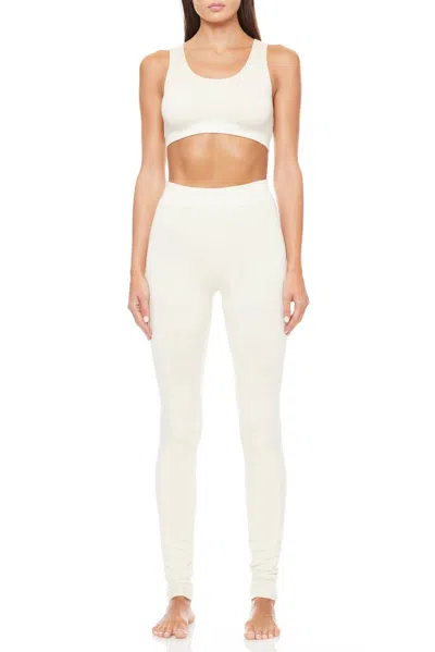 ÉTERNE HIGH RISE LEGGINGS IN CREAM
