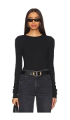 Éterne Long Sleeve Fitted Top In Black