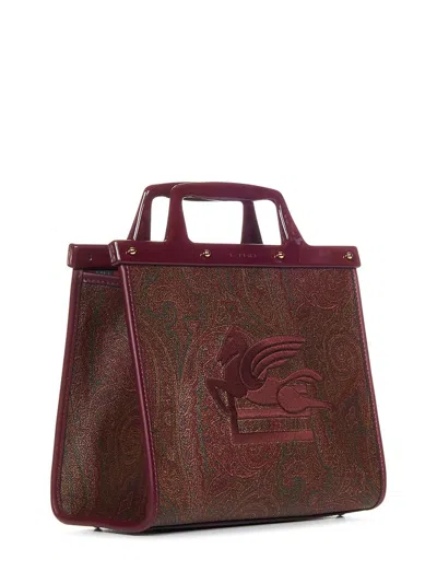 Etro Handbags. In Brown