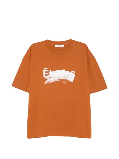 Etudes Studio Smudged Logo-print T-shirt In Orange