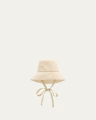 Eugenia Kim Ally Sharkskin Packable Asymmetric Bucket Hat In Beige