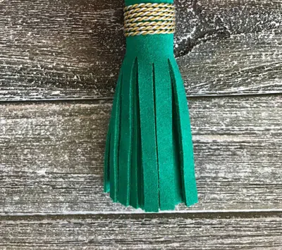 Everley Dawn Suede Tassel Keychains In Emerald In Green
