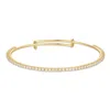Evesaddiction Cz Tennis Charm Bangle In Gold