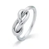Evesaddiction Infinity Knot Sterling Silver Ring In Silver
