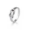 Evesaddiction Sterling Silver Petite Love Knot Ring In Metallic