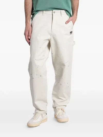 Evisu Paint-splatter Seagull-print Trousers In White