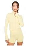 Fabletics Perfect Storm Cropped Train Jacket In Yellow