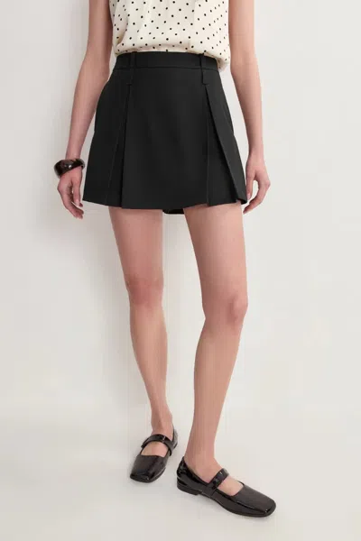 Fabrique Emily Wren Pleated Mid Rise Skort In Fine Twill In Black