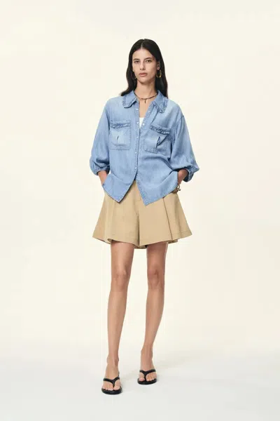 Fabrique Judy Ruffle Trim Puff Sleeve Shirt In Lyocell Denim In Blue