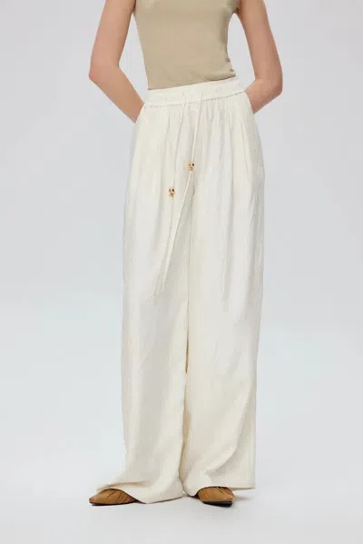 Fabrique Louise Textured Loose Boho Pants In Wrinkled Satin In White