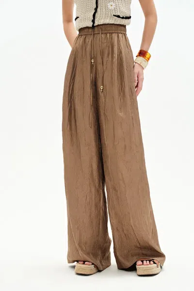 Fabrique Louise Textured Loose Boho Pants In Wrinkled Satin In Yellow