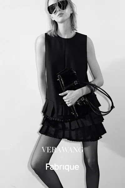 Fabrique Sonata Asymmetric Pleated Hem Sleeveless Dress In Lightweight Blend In Black