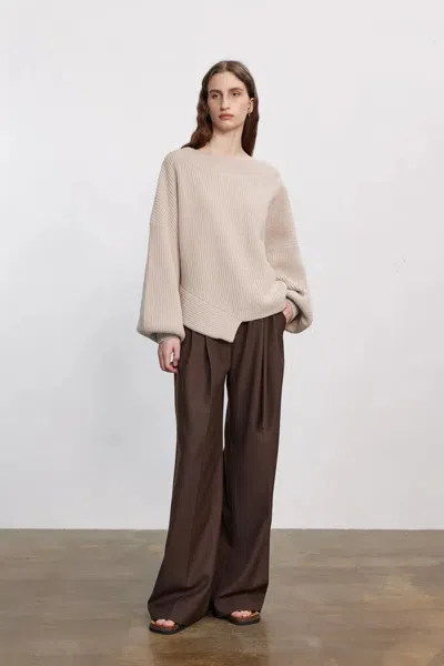 Fabrique Sonia Asymmetrical Hem Sweater In Merino Wool Knit In White