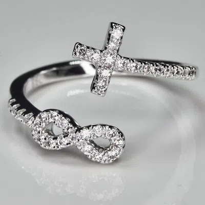 Faire Infinity Cross Rhodium Plated In Silver