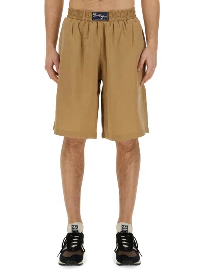 Family First Logo Elasticated Shorts In Brown