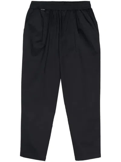 Family First Tapered Trousers In Blue