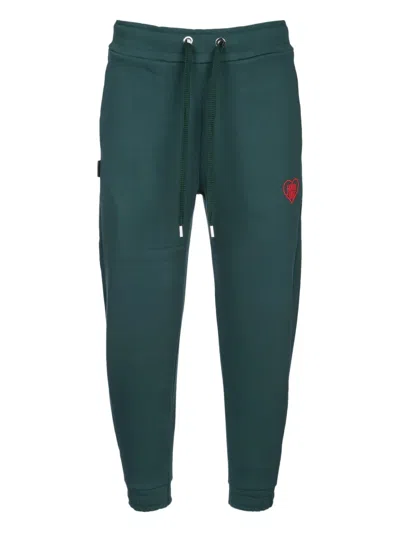 FAMILY FIRST HEART-EMBROIDERED TRACK PANTS