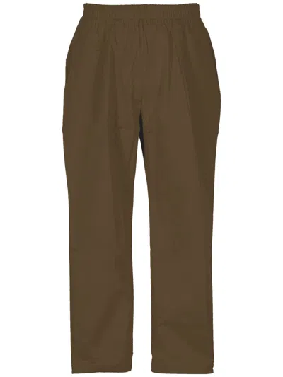 Family First Trousers In Brown