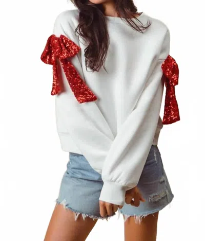 Fantastic Fawn Sequin Bow On Sleeve Sweatshirt In Ivory In Multi