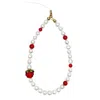 Farra White Freshwater Pearls With Red Raspberry And Bamboo Coral Phone Strap