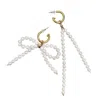 Farra Women's White Freshwater Pearls Butterfly Knot And Tassel Asymmetric Earrings
