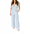 Fashion District La Sail Away Ruffled Open Back Striped Jumpsuit In Blue In Blue