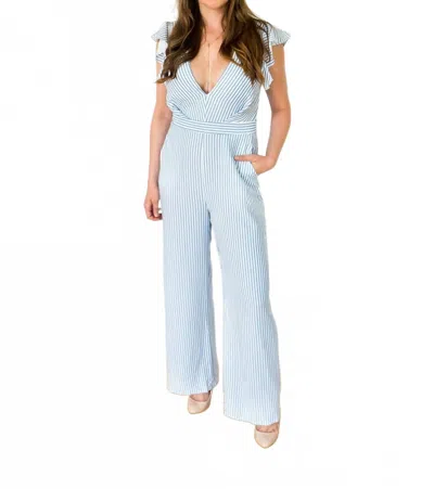 Fashion District La Sail Away Ruffled Open Back Striped Jumpsuit In Blue