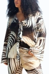 Fashion-szn Curve Curve Tonal Palm Print Ruffle Resort Top In Black