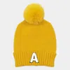 Fashnzfab -a- Initial Monogram Faux Fur Pom Pom Knit Beanie Hat In Yellow