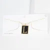 Fashnzfab -l- Gold Dipped Enamel Rectangle Initial Monogram Pendant Necklace In Brown