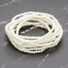 Fashnzfab 10pcs - Pearl Beaded Stretch Multi Layered Bracelets In White