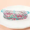Fashnzfab 12pcs - Ribbon Colorful Rhinestone Layered Stretch Bracelets Pink, Silver, Turquoise In Multi