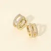 Fashnzfab 14k Gold Dipped Cz Stone Paved Mini Hoop Earrings In Gold