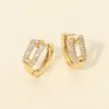 Fashnzfab 14k Gold Dipped Cz Stone Paved Mini Huggie Hoop Earrings - Gold In Gold