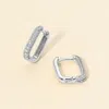 Fashnzfab 14k Gold Dipped Cz Stone Paved Mini Square Huggie Hoop Earrings In Metallic